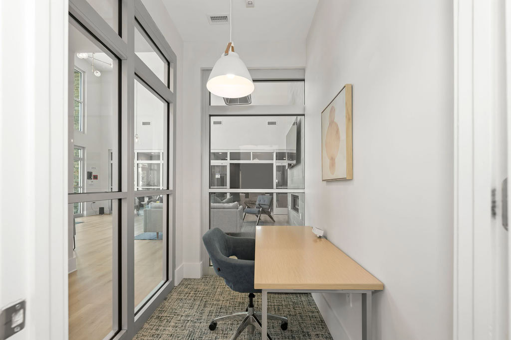 A private study room with glass walls at the Courtney Ridge apartments in Charlotte, NC