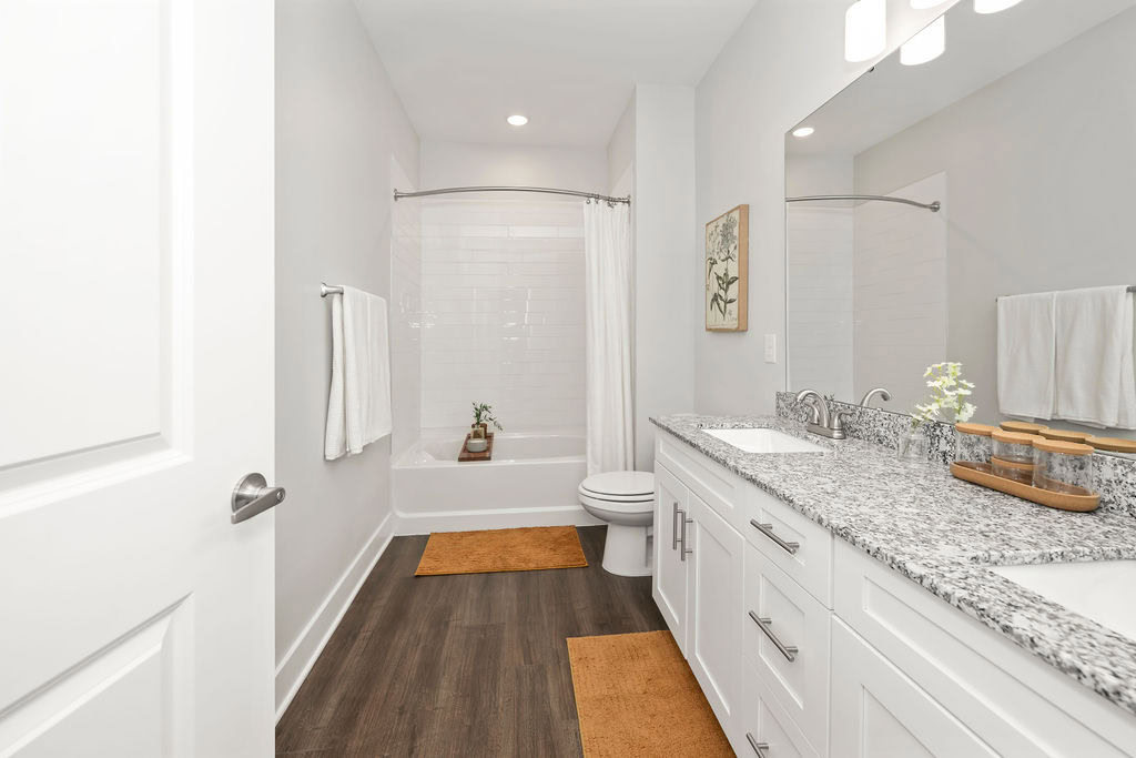A bathroom with a his and hers sink and large vanity at the Courtney Ridge apartments in Charlotte, NC
