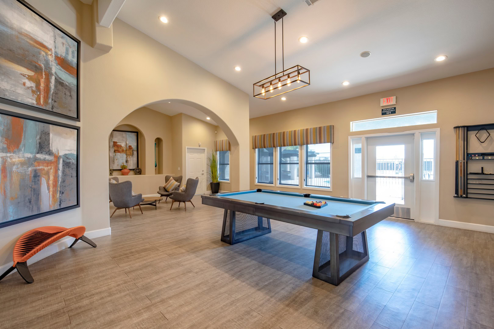 A lounge with a pool table at the Xander 3900 apartments in Northwest Las Vegas