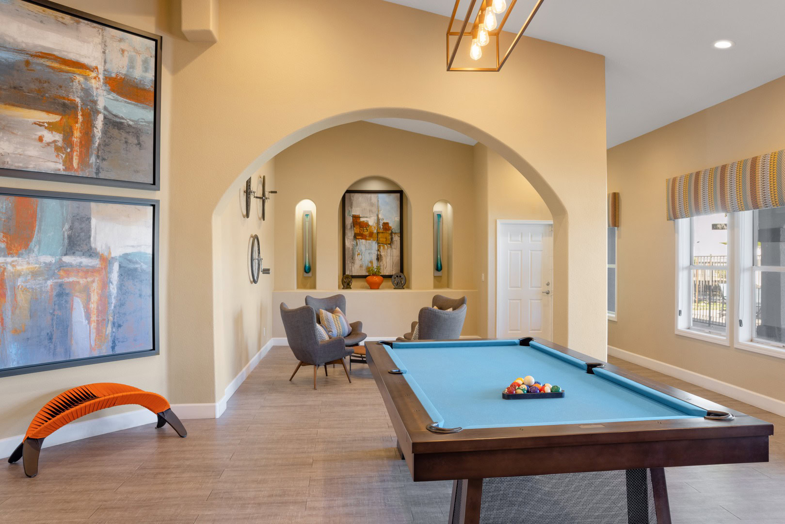A lounge with a pool table at the Xander 3900 apartments in Northwest Las Vegas