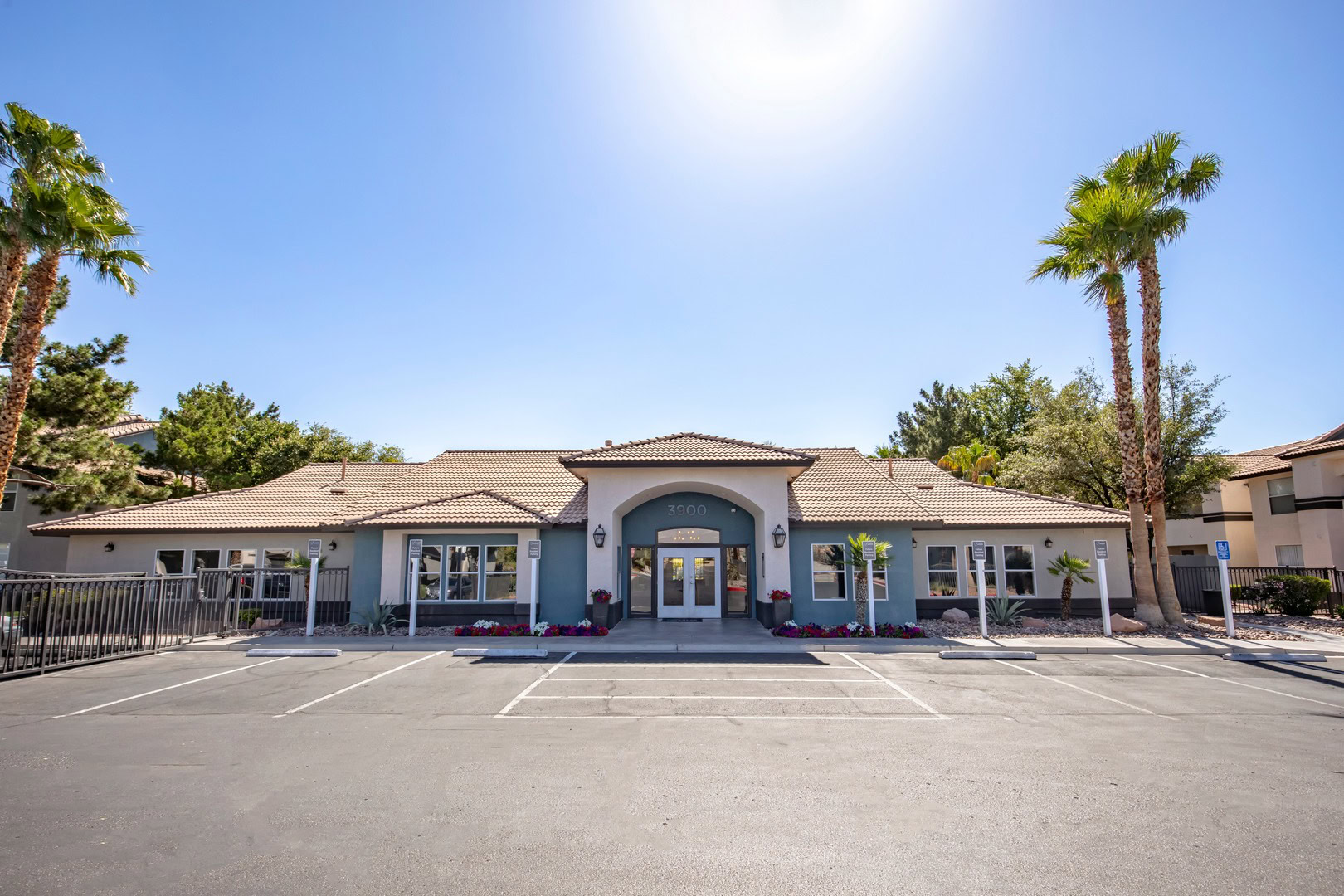 A building at the Xander 3900 apartments with parking space in front of it in northwest Las Vegas