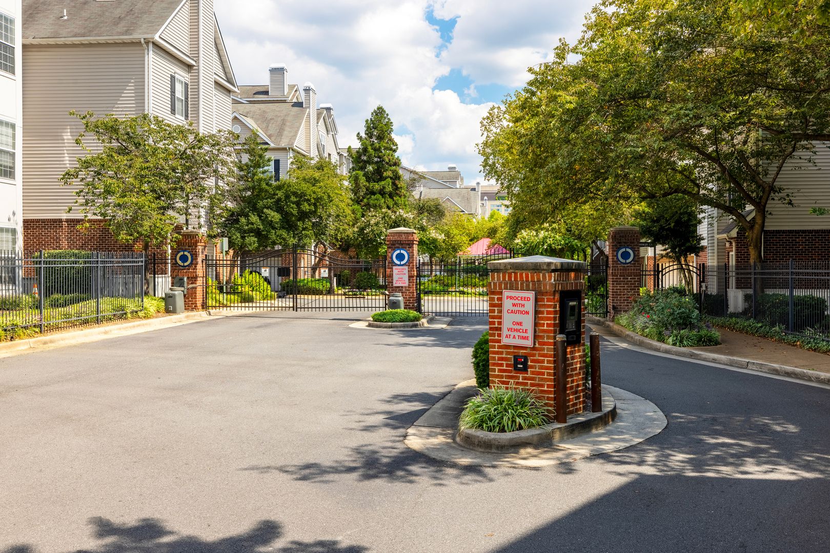 Gated entry to Cameron Court residences.