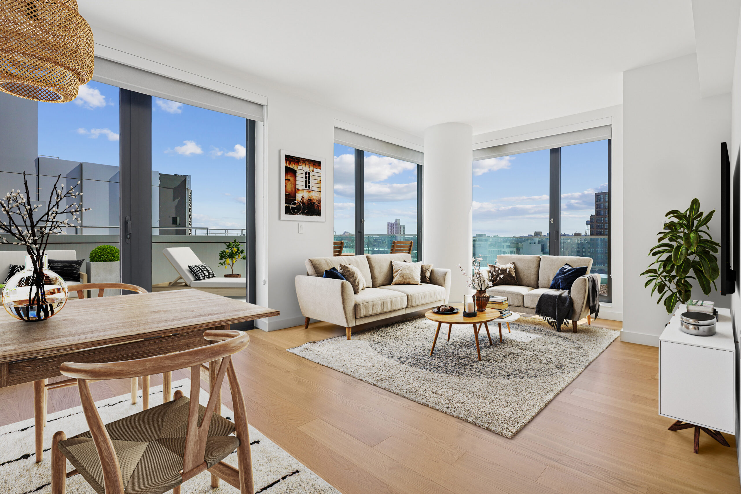 Modern living and dining areas with a view of the outdoor terrace