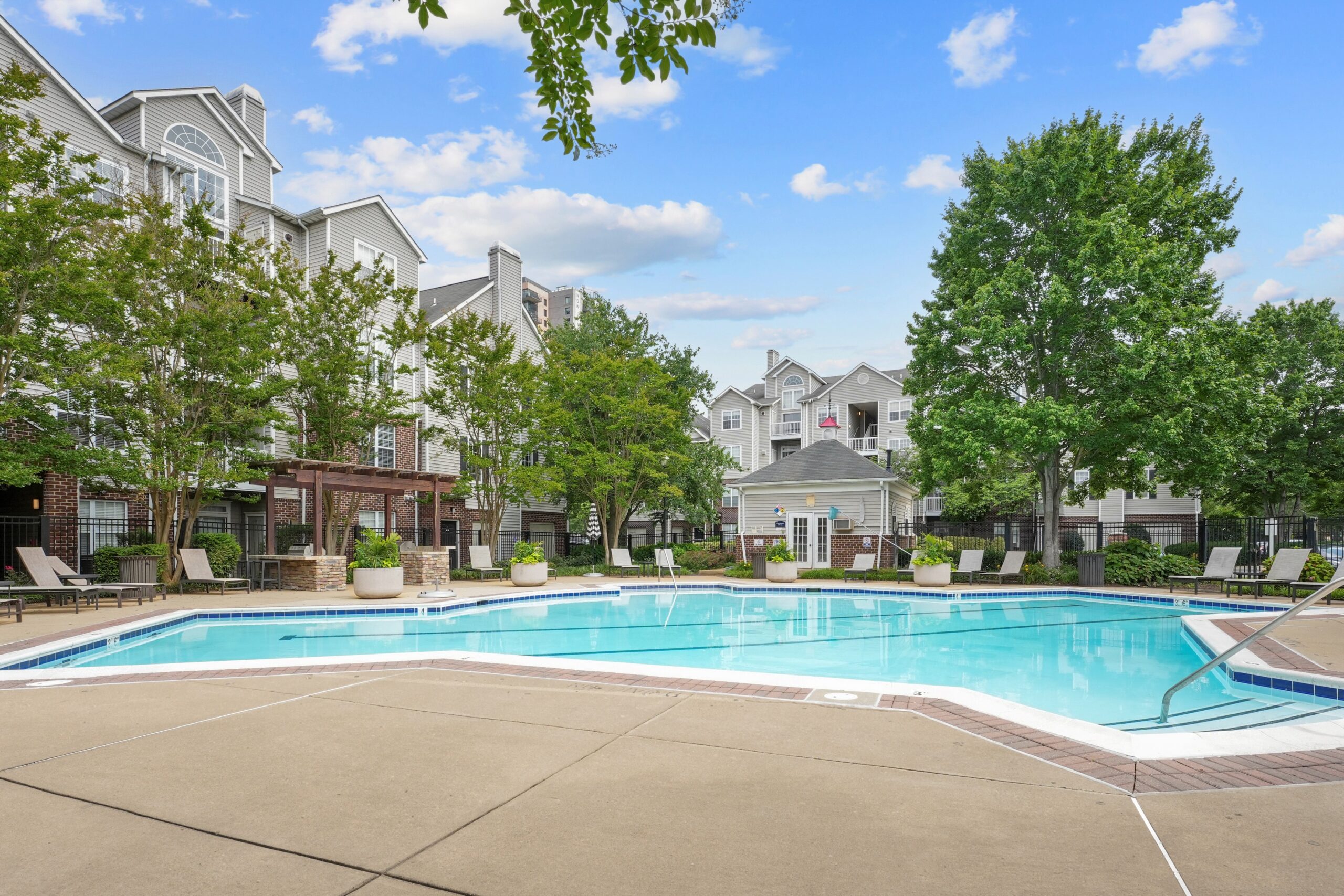 The pool at the reserve at westchester apartments in westchester, ny.