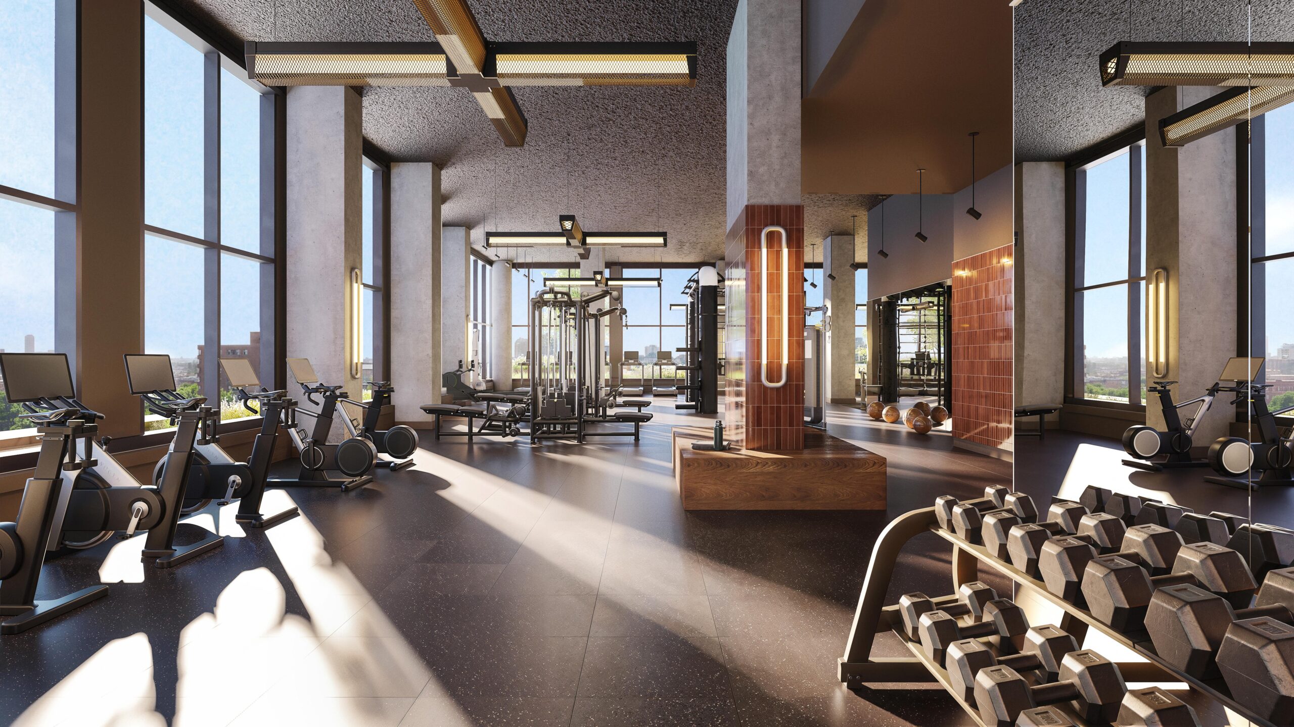The thoughtfully designed and generously scaled TechnoGym fitness center features floor-to-ceiling windows.