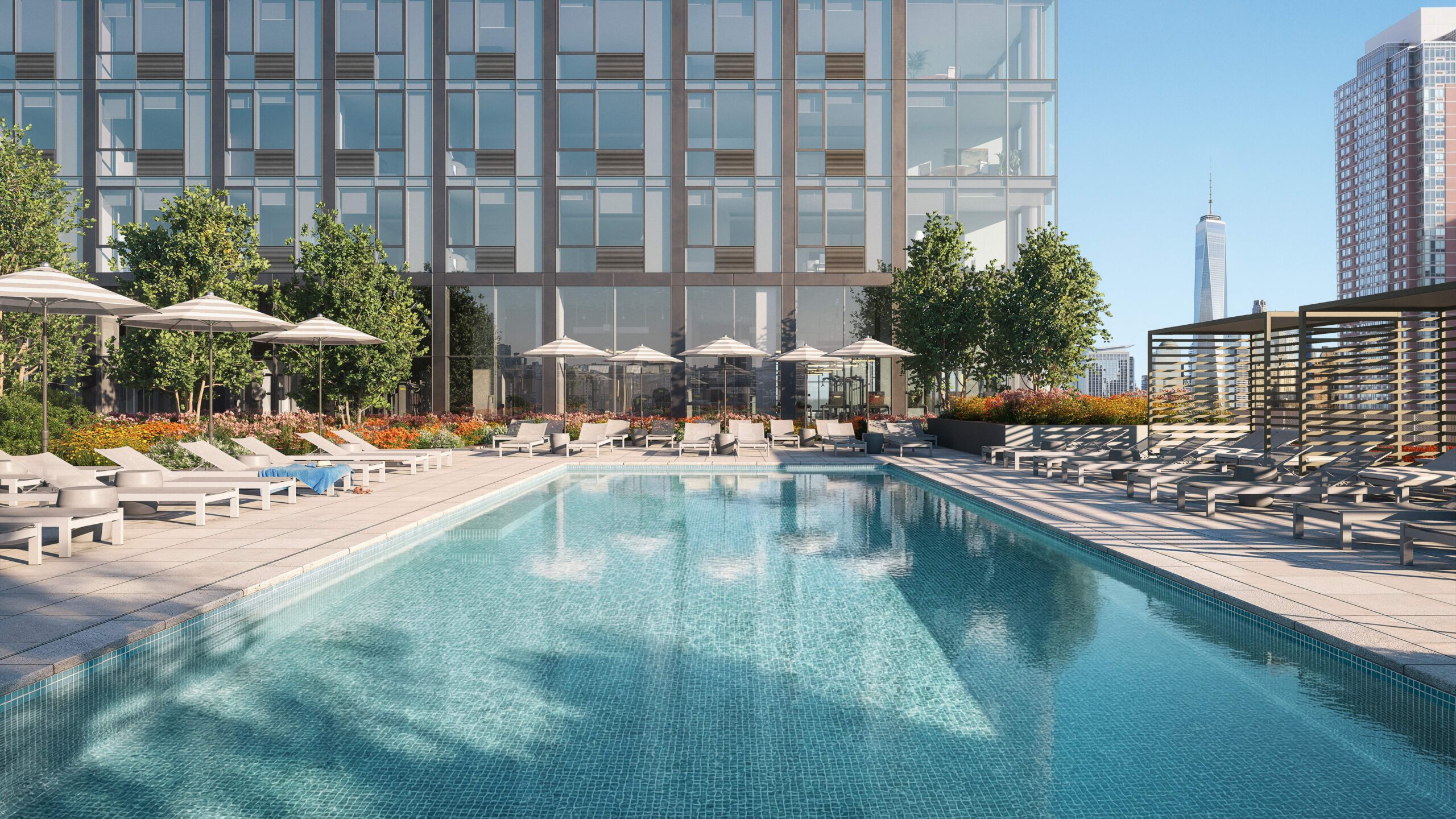 A resort-style pool anchors the space with reservable cabanas and an indoor pool bar.