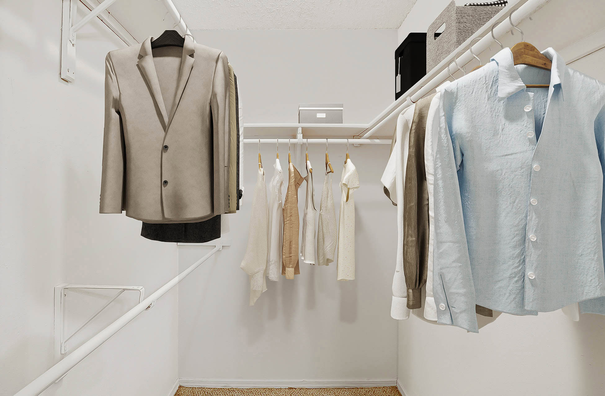 Spacious all white walk-in closet in an apartment in Mckinney Texas featuring built-in shelving, hanging rods, and ample storage space.