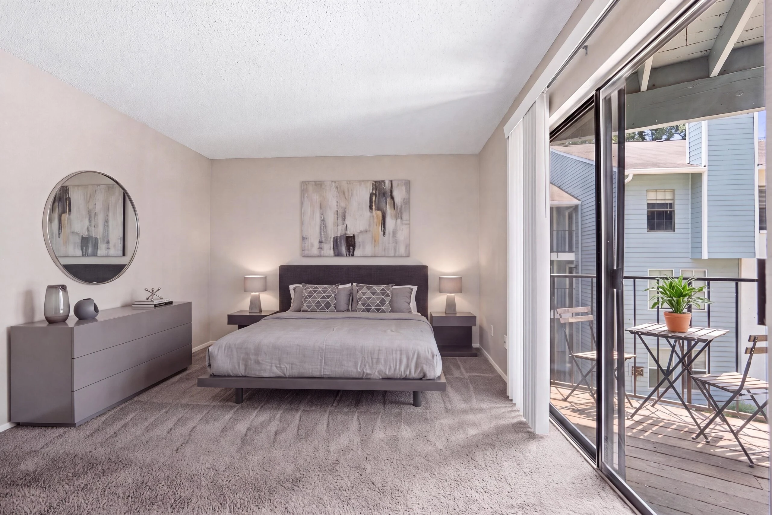 Spacious bedroom that walks out to balcony where residents can enjoy some fresh air.