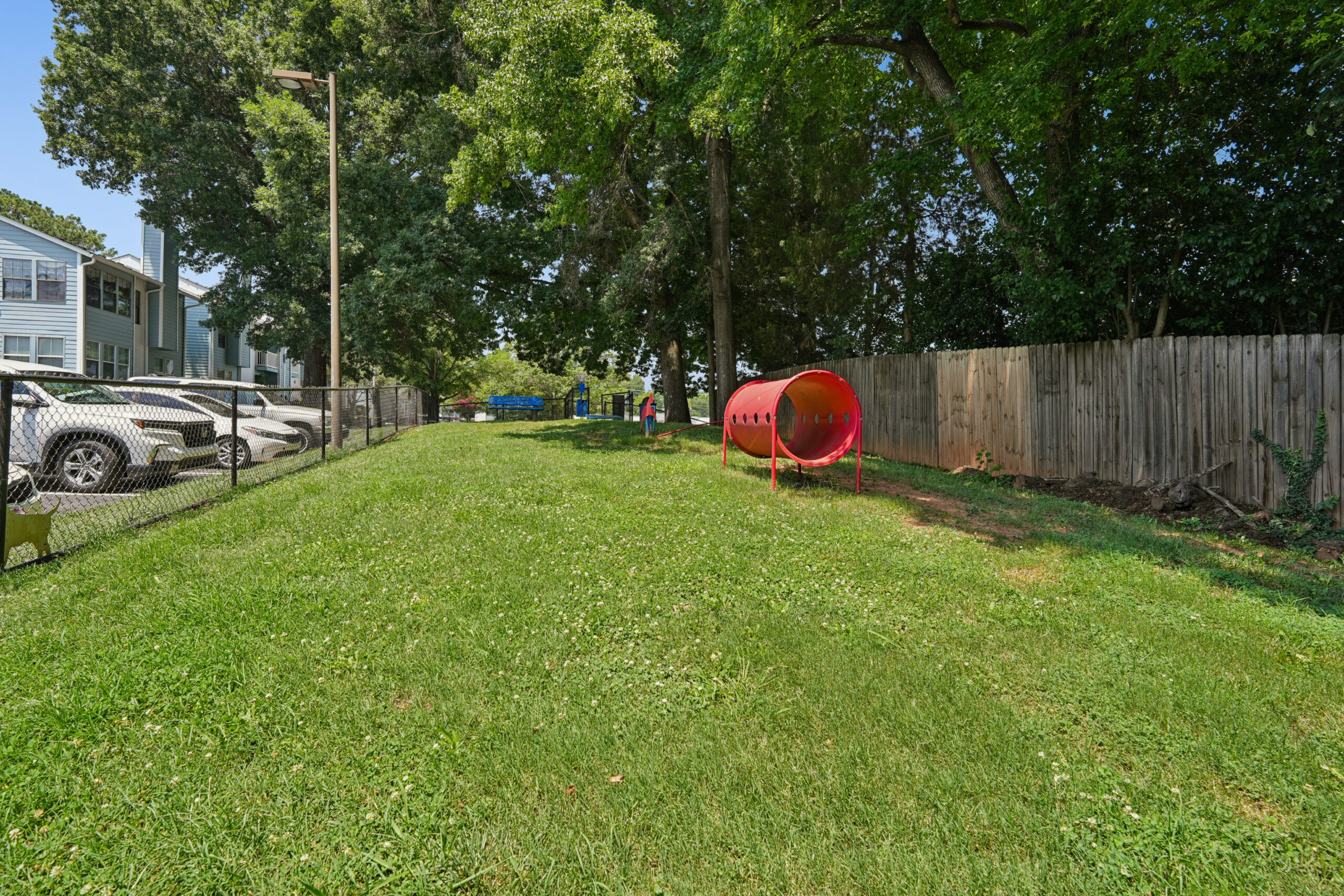Outdoor dog park with obstacle course
