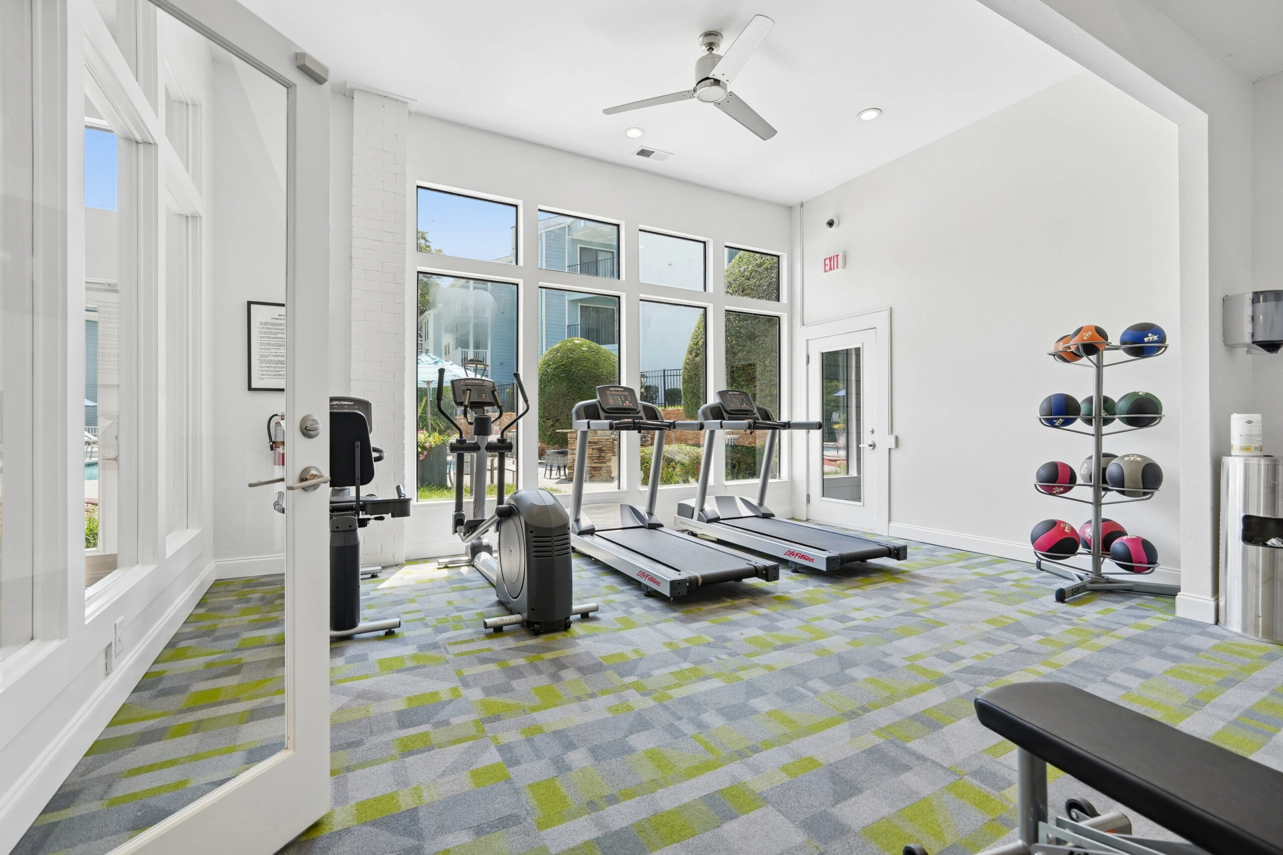 Fitness center with cardio machines and free weights