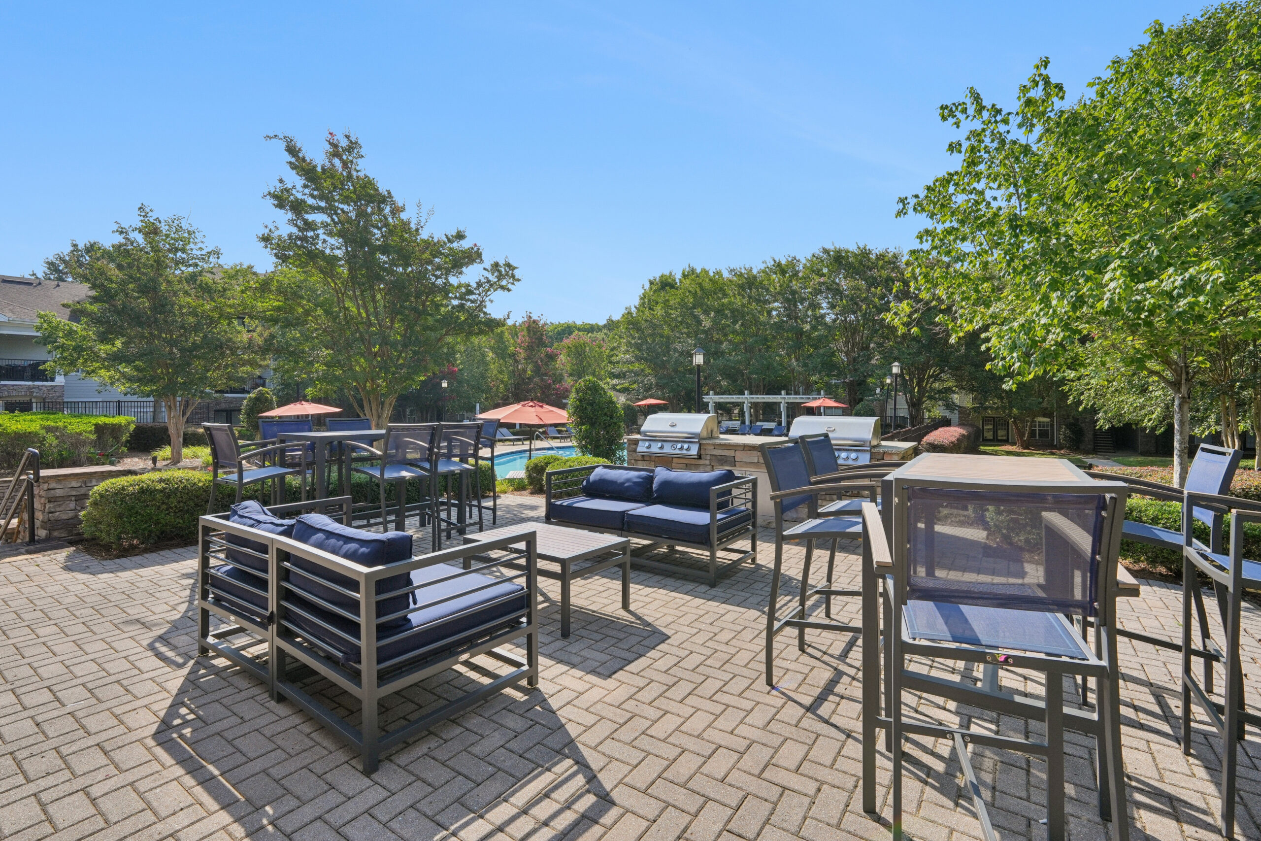 Poolside lounge seating and grills